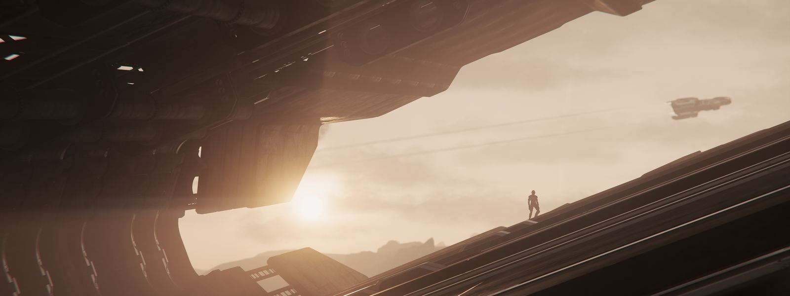A lone figure standing beneath the hull of a huge ship at dawn